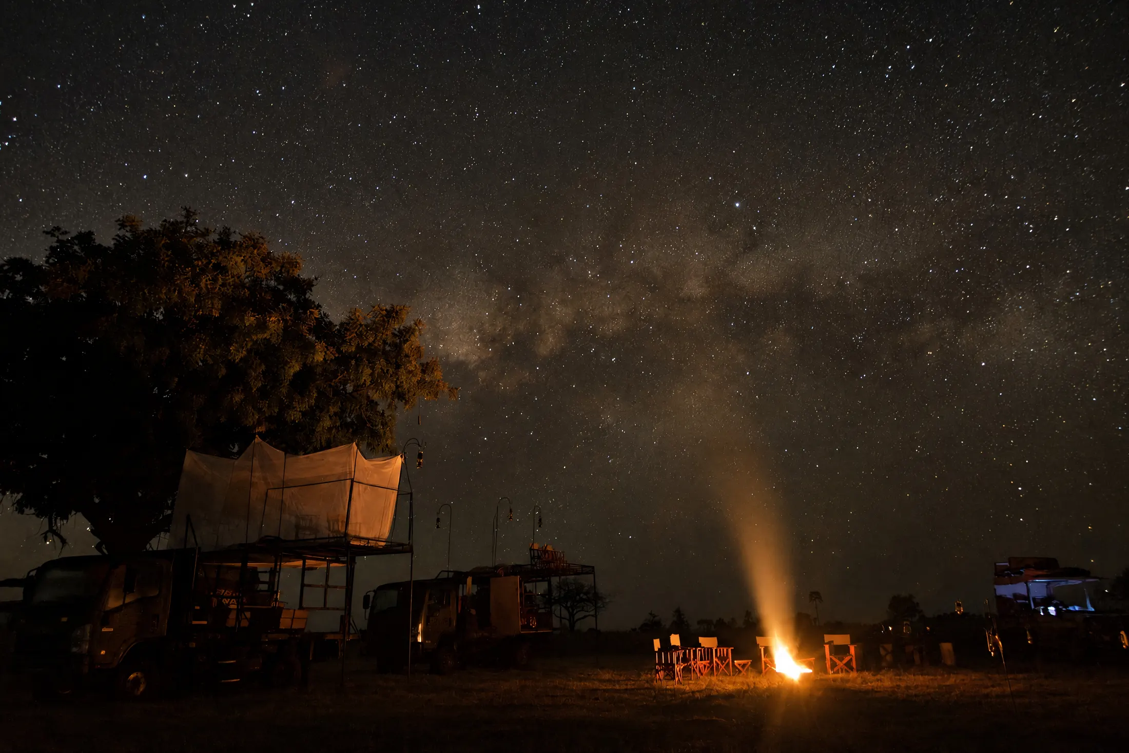 The Milky Way over the sleep out and its fire