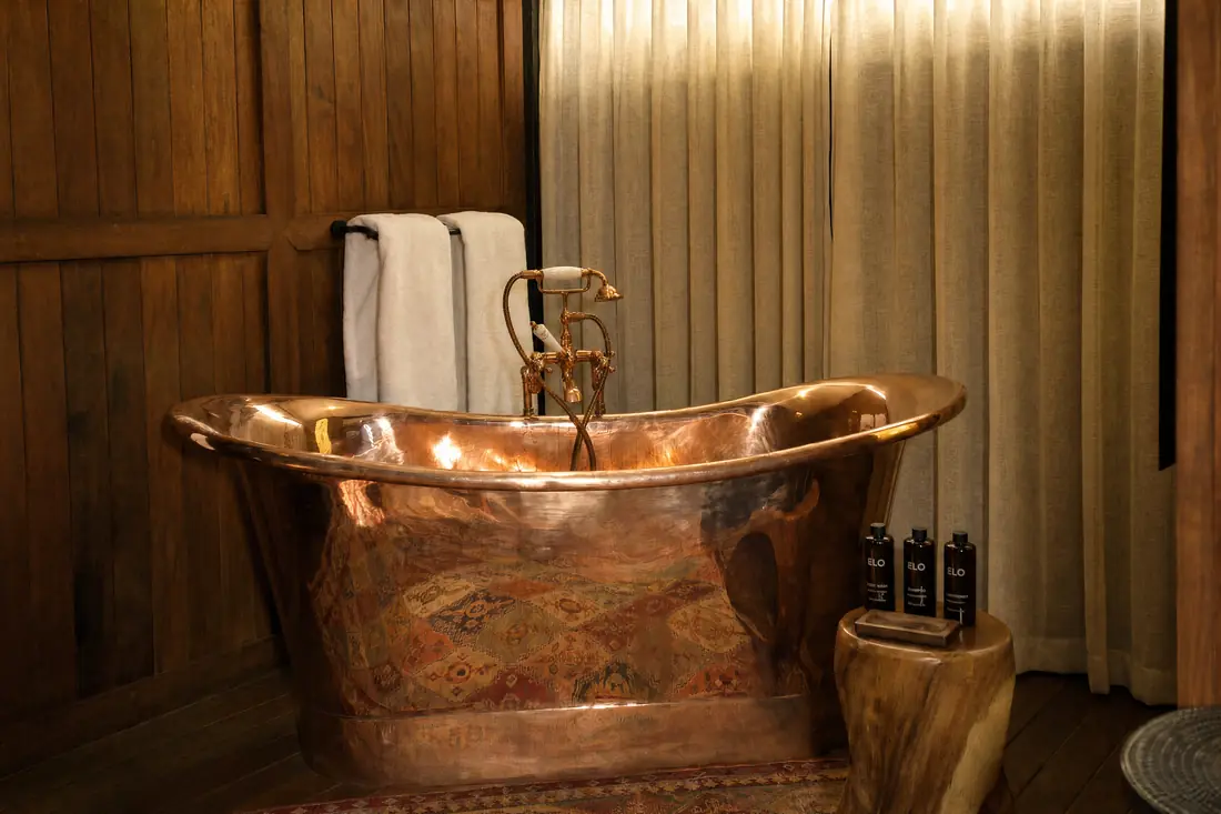 Elo soap and oils left beside the copper bath