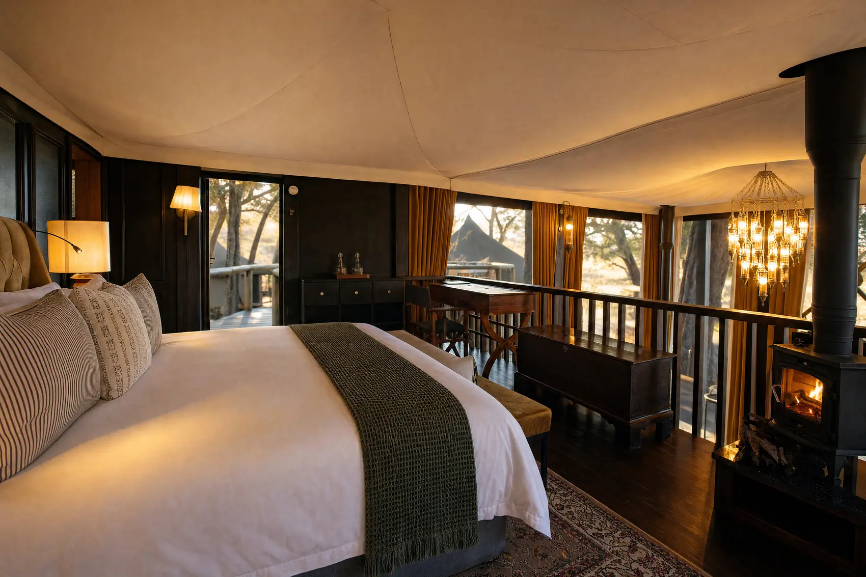 The loft bedroom under its chandelier