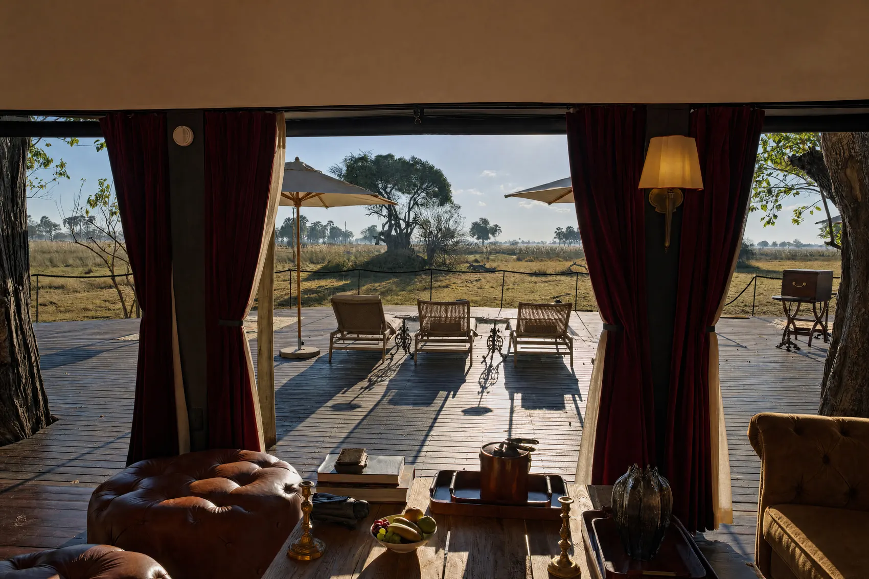 The villa lounge opening onto the deck